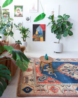 Vintage Turkish rug in living room setting, old rug, antique rug, pastel colors, faded colors, Turkish rug, vintage rug, soft rug, Portland, Oregon, rug store, rug shop, local shop