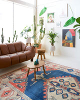 Vintage Turkish rug in living room setting, old rug, antique rug, pastel colors, faded colors, Turkish rug, vintage rug, soft rug, Portland, Oregon, rug store, rug shop, local shop