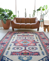 Vintage Turkish rug in a living room setting, pile rug, Turkish rug, vintage rug, portland, rug shop, bright colors, wild shaman, soft rug, bold color, Portland, Oregon, rug store, rug shop, local shop