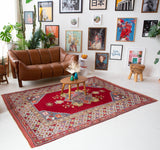 Vintage Turkish rug in a living room setting, pile rug, Turkish rug, vintage rug, portland, rug shop, bright colors, wild shaman, soft rug, bold color, Portland, Oregon, rug store, rug shop, local shop, antique rug