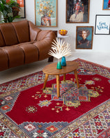 Vintage Turkish rug in a living room setting, pile rug, Turkish rug, vintage rug, portland, rug shop, bright colors, wild shaman, soft rug, bold color, Portland, Oregon, rug store, rug shop, local shop, antique rug