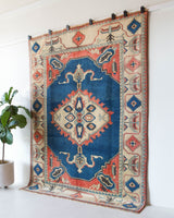 Vintage Turkish rug in living room setting, old rug, antique rug, pastel colors, faded colors, Turkish rug, vintage rug, soft rug, Portland, Oregon, rug store, rug shop, local shop