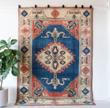 Vintage Turkish rug in living room setting, old rug, antique rug, pastel colors, faded colors, Turkish rug, vintage rug, soft rug, Portland, Oregon, rug store, rug shop, local shop