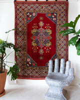 Vintage Turkish rug in a living room setting, pile rug, Turkish rug, vintage rug, portland, rug shop, bright colors, wild shaman, soft rug, bold color, Portland, Oregon, rug store, rug shop, local shop, antique rug