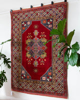 Vintage Turkish rug in a living room setting, pile rug, Turkish rug, vintage rug, portland, rug shop, bright colors, wild shaman, soft rug, bold color, Portland, Oregon, rug store, rug shop, local shop, antique rug