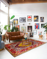 Vintage Turkish rug in a living room setting, pile rug, Turkish rug, vintage rug, portland, rug shop, bright colors, wild shaman, soft rug, bold color, Portland, Oregon, rug store, rug shop, local shop, antique rug