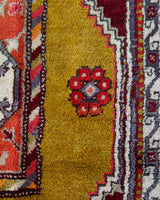 Vintage Turkish rug in a living room setting, pile rug, Turkish rug, vintage rug, portland, rug shop, bright colors, wild shaman, soft rug, bold color, Portland, Oregon, rug store, rug shop, local shop, antique rug