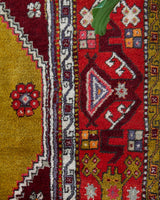 Vintage Turkish rug in a living room setting, pile rug, Turkish rug, vintage rug, portland, rug shop, bright colors, wild shaman, soft rug, bold color, Portland, Oregon, rug store, rug shop, local shop, antique rug