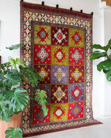 Vintage Turkish rug in a living room setting, pile rug, Turkish rug, vintage rug, portland, rug shop, bright colors, wild shaman, soft rug, bold color, Portland, Oregon, rug store, rug shop, local shop, antique rug