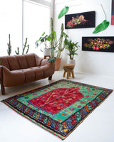 Vintage Turkish rug in a living room setting, pile rug, Turkish rug, vintage rug, portland, rug shop, bright colors, wild shaman, soft rug, bold color, Portland, Oregon, rug store, rug shop, local shop, antique rug