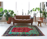 Vintage Turkish rug in a living room setting, pile rug, Turkish rug, vintage rug, portland, rug shop, bright colors, wild shaman, soft rug, bold color, Portland, Oregon, rug store, rug shop, local shop, antique rug