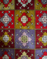 Vintage Turkish rug in a living room setting, pile rug, Turkish rug, vintage rug, portland, rug shop, bright colors, wild shaman, soft rug, bold color, Portland, Oregon, rug store, rug shop, local shop, antique rug