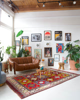 Vintage Turkish rug in a living room setting, pile rug, Turkish rug, vintage rug, portland, rug shop, bright colors, wild shaman, soft rug, bold color, Portland, Oregon, rug store, rug shop, local shop, antique rug