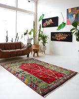 Vintage Turkish rug in a living room setting, pile rug, Turkish rug, vintage rug, portland, rug shop, bright colors, wild shaman, soft rug, bold color, Portland, Oregon, rug store, rug shop, local shop, antique rug