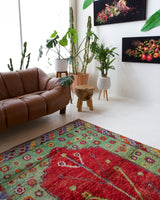 Vintage Turkish rug in a living room setting, pile rug, Turkish rug, vintage rug, portland, rug shop, bright colors, wild shaman, soft rug, bold color, Portland, Oregon, rug store, rug shop, local shop, antique rug