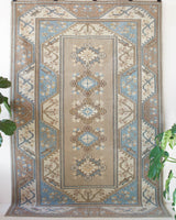 old rug, antique rug, earthy colors, faded colors, Turkish rug, vintage rug, worn out rug, distressed rug, Portland, Oregon, rug store, rug shop, local shop, pile rug, cool colors, light colors