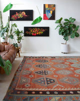 Vintage kilim rug in room decor setting, old rug, antique rug, pastel colors, faded colors, Turkish rug, vintage rug, soft rug, Portland, Oregon, rug store, rug shop, local shop, bold colors, bright colors, faded colors