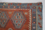 Vintage kilim rug in room decor setting, old rug, antique rug, pastel colors, faded colors, Turkish rug, vintage rug, soft rug, Portland, Oregon, rug store, rug shop, local shop, bold colors, bright colors, faded colors