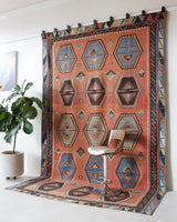 Vintage kilim rug in room decor setting, old rug, antique rug, pastel colors, faded colors, Turkish rug, vintage rug, soft rug, Portland, Oregon, rug store, rug shop, local shop, bold colors, bright colors, faded colors
