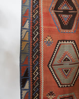 Vintage kilim rug in room decor setting, old rug, antique rug, pastel colors, faded colors, Turkish rug, vintage rug, soft rug, Portland, Oregon, rug store, rug shop, local shop, bold colors, bright colors, faded colors