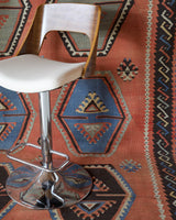 Vintage kilim rug in room decor setting, old rug, antique rug, pastel colors, faded colors, Turkish rug, vintage rug, soft rug, Portland, Oregon, rug store, rug shop, local shop, bold colors, bright colors, faded colors