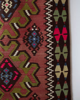 Vintage kilim rug in room decor setting, old rug, antique rug, pastel colors, faded colors, Turkish rug, vintage rug, soft rug, Portland, Oregon, rug store, rug shop, local shop, bold colors, bright colors, faded colors