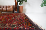 old rug, antique rug, Turkish rug, Portland, Oregon, rug store, rug shop, local shop, bright colors, wild shaman, large rug, area rug, red rug, bold color, burgundy, dark red, soft rug