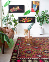 Vintage kilim rug in room decor setting, old rug, antique rug, pastel colors, faded colors, Turkish rug, vintage rug, soft rug, Portland, Oregon, rug store, rug shop, local shop, bold colors, bright colors, faded colors