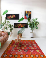 Vintage kilim rug in living room setting, bright colors, wild shaman, soft rug, bold color, Portland, Oregon, rug store, rug shop, local shop, vintage rug, modern kilim, warm colors