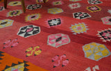 Vintage kilim rug in living room setting, bright colors, wild shaman, soft rug, bold color, Portland, Oregon, rug store, rug shop, local shop, vintage rug, modern kilim, warm colors