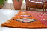 Vintage kilim rug in living room setting, bright colors, wild shaman, soft rug, bold color, Portland, Oregon, rug store, rug shop, local shop, vintage rug, modern kilim, warm colors