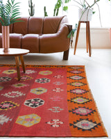 Vintage kilim rug in living room setting, bright colors, wild shaman, soft rug, bold color, Portland, Oregon, rug store, rug shop, local shop, vintage rug, modern kilim, warm colors