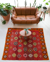 Vintage kilim rug in living room setting, bright colors, wild shaman, soft rug, bold color, Portland, Oregon, rug store, rug shop, local shop, vintage rug, modern kilim, warm colors