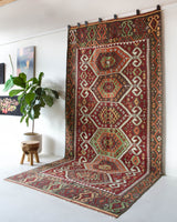 Vintage kilim rug in living room setting, bright colors, wild shaman, soft rug, bold color, Portland, Oregon, rug store, rug shop, local shop, vintage rug, modern kilim, warm colors