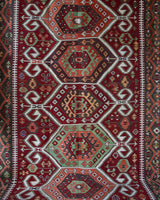 Vintage kilim rug in living room setting, bright colors, wild shaman, soft rug, bold color, Portland, Oregon, rug store, rug shop, local shop, vintage rug, modern kilim, warm colors