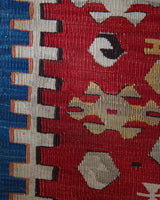 Vintage kilim rug in living room setting, old rug, antique rug, pastel colors, faded colors, Turkish rug, vintage rug, soft rug, Portland, Oregon, rug store, rug shop, local shop, earthy tones, earthy colors, warm colors