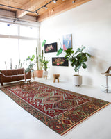 Vintage kilim rug in living room setting, bright colors, wild shaman, soft rug, bold color, Portland, Oregon, rug store, rug shop, local shop, vintage rug, modern kilim, warm colors
