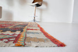 Vintage kilim rug in room decor setting, old rug, antique rug, pastel colors, faded colors, Turkish rug, vintage rug, soft rug, Portland, Oregon, rug store, rug shop, local shop, bold colors, bright colors, faded colors