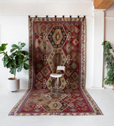 Vintage kilim rug in room decor setting, old rug, antique rug, pastel colors, faded colors, Turkish rug, vintage rug, soft rug, Portland, Oregon, rug store, rug shop, local shop, bold colors, bright colors, faded colors