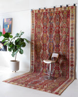 Vintage kilim rug in room decor setting, old rug, antique rug, pastel colors, faded colors, Turkish rug, vintage rug, soft rug, Portland, Oregon, rug store, rug shop, local shop, bold colors, bright colors, faded colors