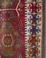 Vintage kilim rug in room decor setting, old rug, antique rug, pastel colors, faded colors, Turkish rug, vintage rug, soft rug, Portland, Oregon, rug store, rug shop, local shop, bold colors, bright colors, faded colors