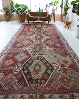 Vintage kilim rug in room decor setting, old rug, antique rug, pastel colors, faded colors, Turkish rug, vintage rug, soft rug, Portland, Oregon, rug store, rug shop, local shop, bold colors, bright colors, faded colors