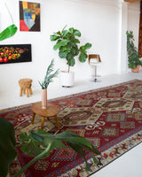 Vintage kilim rug in room decor setting, old rug, antique rug, pastel colors, faded colors, Turkish rug, vintage rug, soft rug, Portland, Oregon, rug store, rug shop, local shop, bold colors, bright colors, faded colors