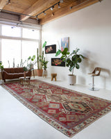 Vintage kilim rug in room decor setting, old rug, antique rug, pastel colors, faded colors, Turkish rug, vintage rug, soft rug, Portland, Oregon, rug store, rug shop, local shop, bold colors, bright colors, faded colors