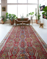 Vintage kilim rug in room decor setting, old rug, antique rug, pastel colors, faded colors, Turkish rug, vintage rug, soft rug, Portland, Oregon, rug store, rug shop, local shop, bold colors, bright colors, faded colors