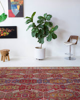 Vintage kilim rug in room decor setting, old rug, antique rug, pastel colors, faded colors, Turkish rug, vintage rug, soft rug, Portland, Oregon, rug store, rug shop, local shop, bold colors, bright colors, faded colors