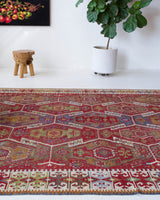 Vintage kilim rug in room decor setting, old rug, antique rug, pastel colors, faded colors, Turkish rug, vintage rug, soft rug, Portland, Oregon, rug store, rug shop, local shop, bold colors, bright colors, faded colors