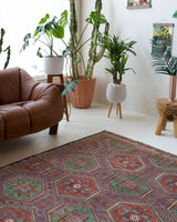 Vintage kilim rug in room decor setting, old rug, antique rug, pastel colors, faded colors, Turkish rug, vintage rug, soft rug, Portland, Oregon, rug store, rug shop, local shop, bold colors, bright colors, faded colors