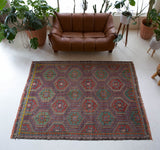 Vintage kilim rug in room decor setting, old rug, antique rug, pastel colors, faded colors, Turkish rug, vintage rug, soft rug, Portland, Oregon, rug store, rug shop, local shop, bold colors, bright colors, faded colors