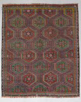 Vintage kilim rug in room decor setting, old rug, antique rug, pastel colors, faded colors, Turkish rug, vintage rug, soft rug, Portland, Oregon, rug store, rug shop, local shop, bold colors, bright colors, faded colors